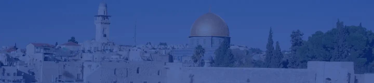 A monochromatic blue-filtered skyline of a bustling city with modern skyscrapers and iconic architecture.